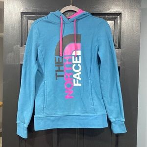 Woman’s small North Face hoodie. Teal and pink